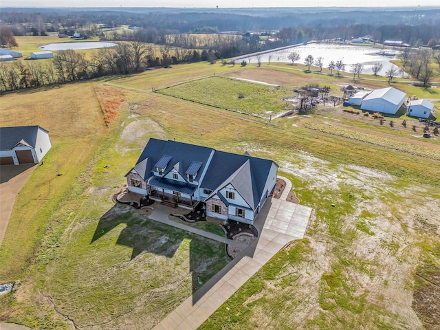 aerial view featuring a rural view and a water view