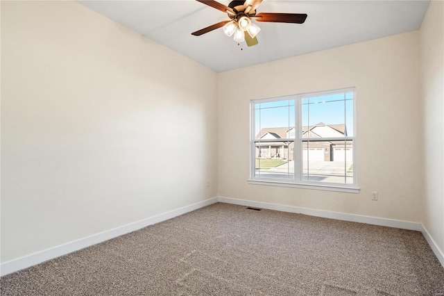 unfurnished room featuring carpet flooring and ceiling fan