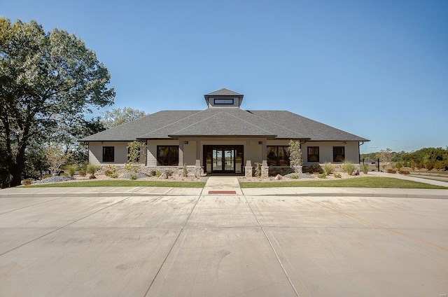 prairie-style home with french doors