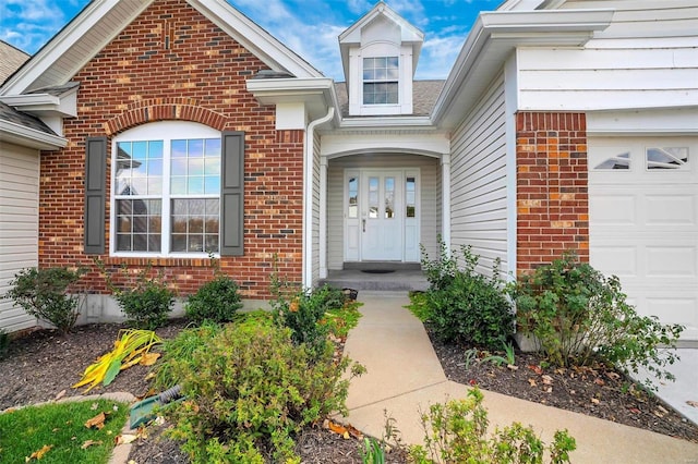 entrance to property with a garage