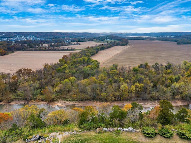 aerial view with a water view and a rural view