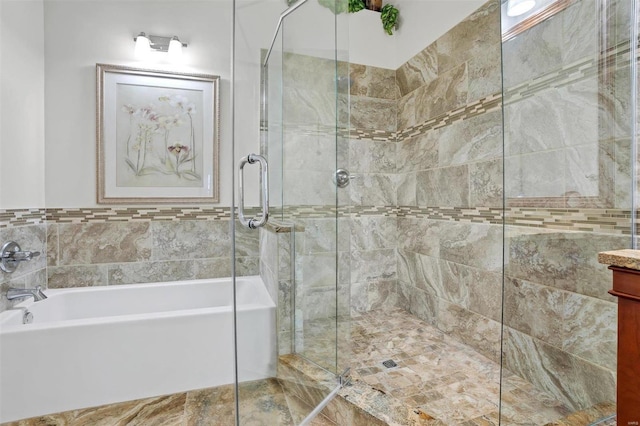 bathroom featuring vanity and separate shower and tub