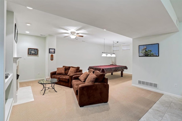 living room featuring ceiling fan and billiards