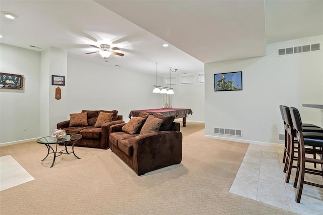 tiled living room featuring ceiling fan and billiards