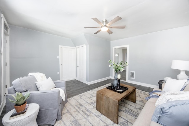 living room featuring ceiling fan and light wood-type flooring