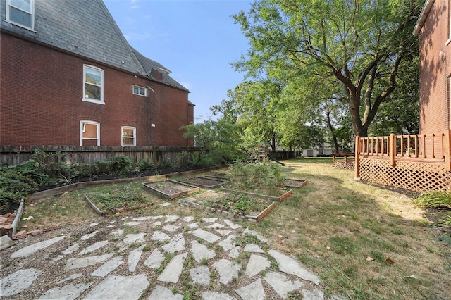 view of yard with a wooden deck