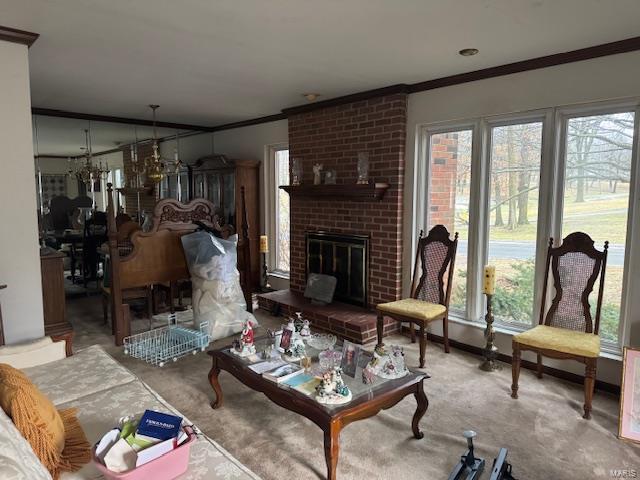 carpeted living room with crown molding and a fireplace