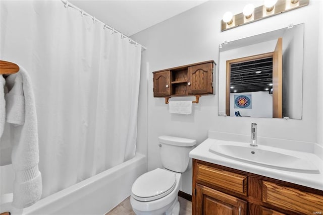 full bathroom featuring toilet, shower / bath combo, and vanity