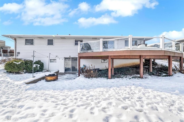 view of snow covered house