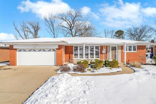 ranch-style house featuring a garage