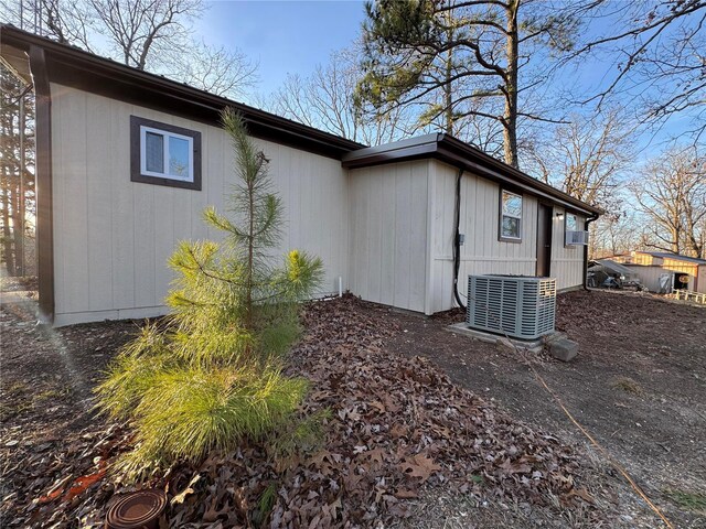 view of property exterior with cooling unit