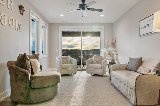 living room featuring ceiling fan