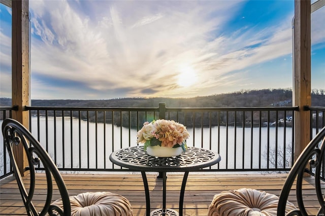 balcony featuring a water view