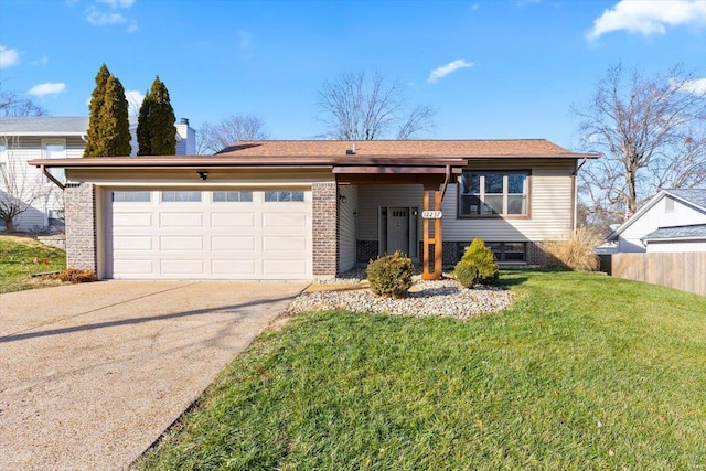 view of front facade featuring a front lawn and a garage