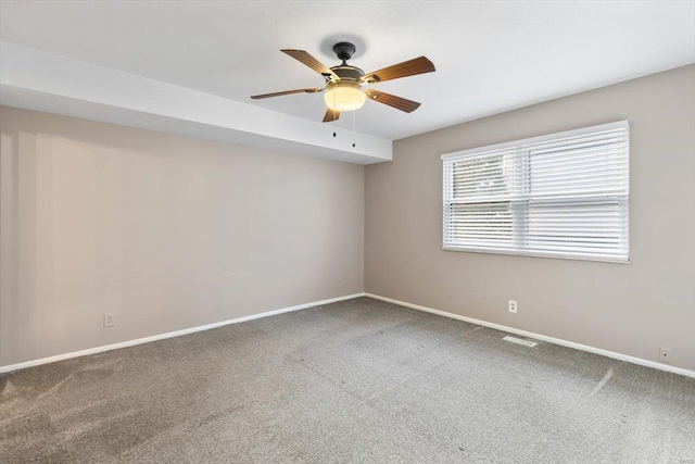 carpeted empty room with ceiling fan