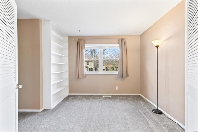 unfurnished bedroom with carpet