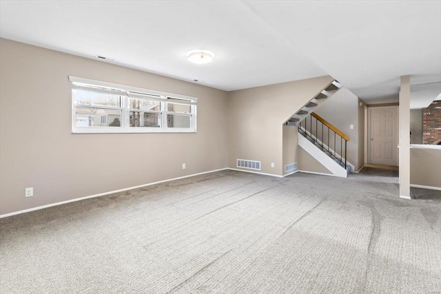 unfurnished living room with carpet