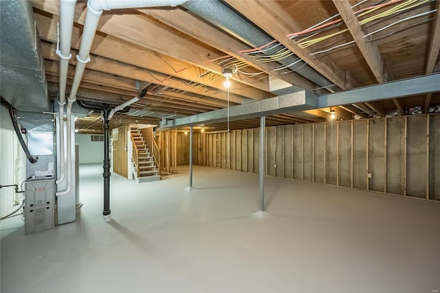 basement featuring heating unit