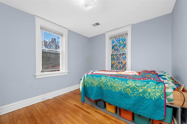 bedroom featuring hardwood / wood-style floors