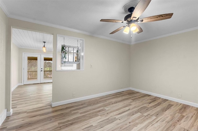 unfurnished room with french doors, light hardwood / wood-style floors, ceiling fan, and crown molding