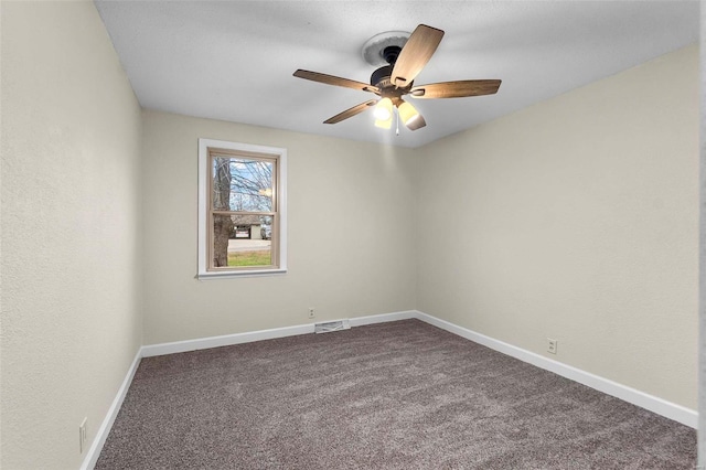 carpeted empty room with ceiling fan