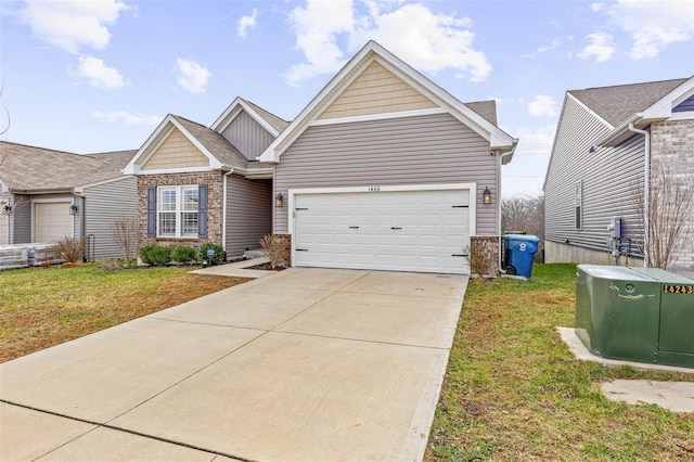 view of front of house featuring a front lawn and a garage