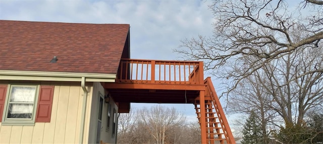 view of property exterior featuring a wooden deck