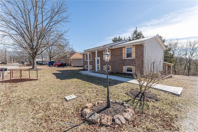 exterior space with a yard