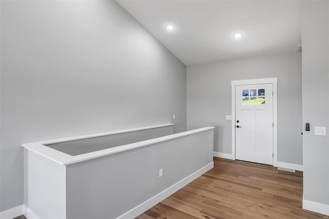 entryway with wood-type flooring