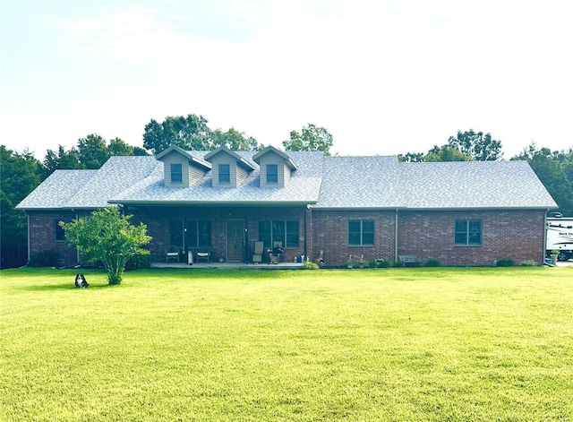 back of house featuring a yard