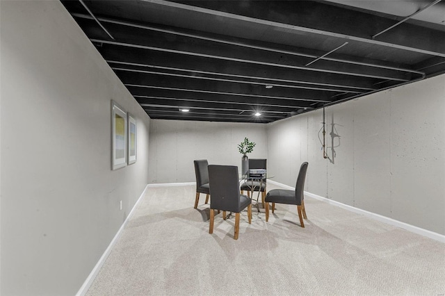 view of carpeted dining space