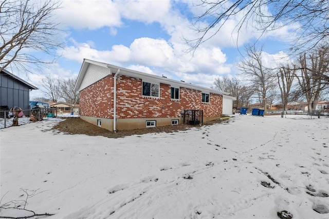 view of snow covered property