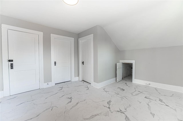 bonus room featuring vaulted ceiling