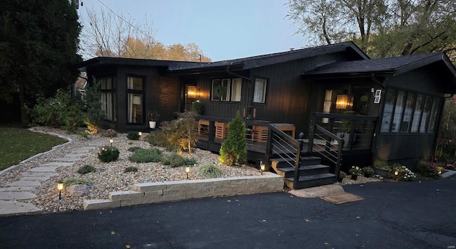 view of front facade featuring a sunroom