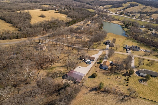 drone / aerial view featuring a water view and a rural view