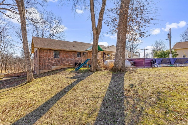 view of yard featuring a playground