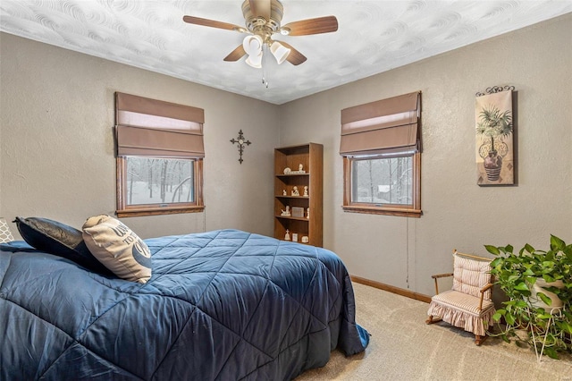 bedroom with carpet flooring and ceiling fan