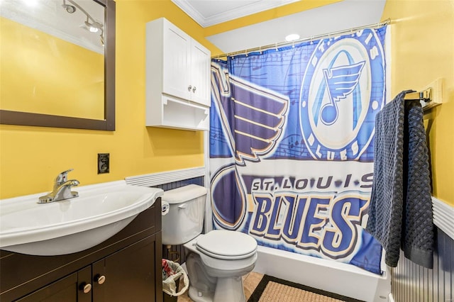 bathroom with ornamental molding, curtained shower, vanity, and toilet