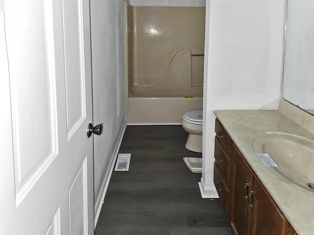 full bathroom with shower / washtub combination, vanity, and toilet