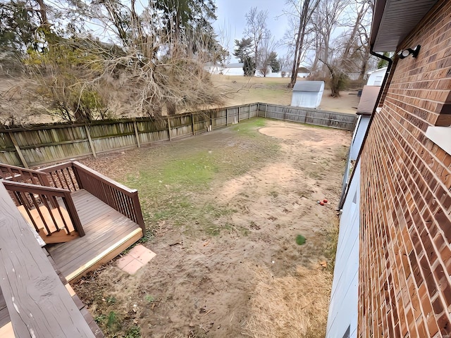 view of yard with a deck