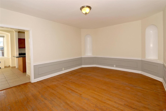 empty room with light wood-type flooring