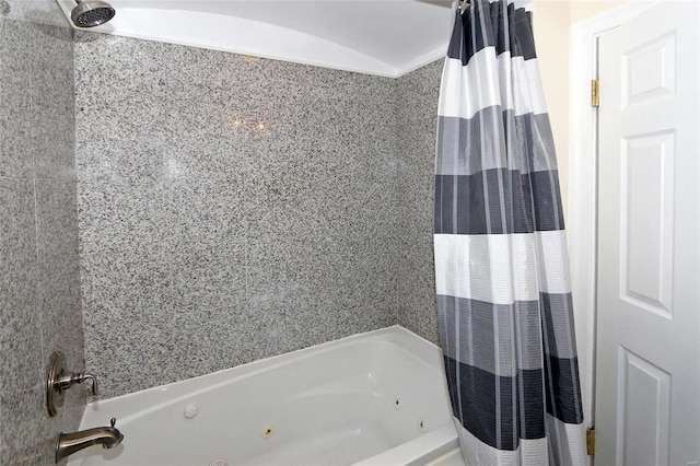 bathroom featuring shower / bathtub combination with curtain