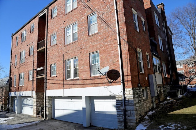 view of building exterior with a garage