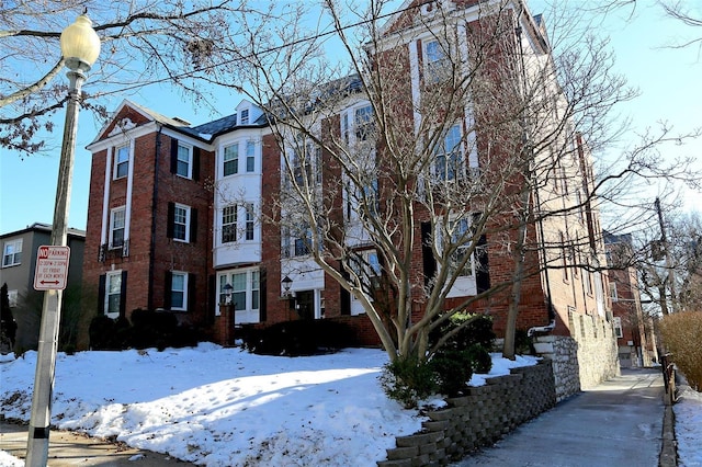 view of snow covered property