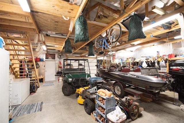 garage with a workshop area