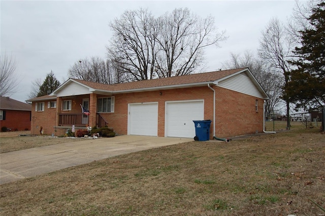 single story home featuring a front yard and a garage