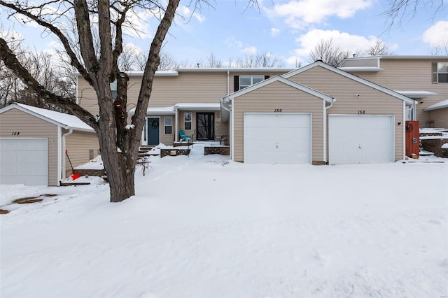 front of property with a garage