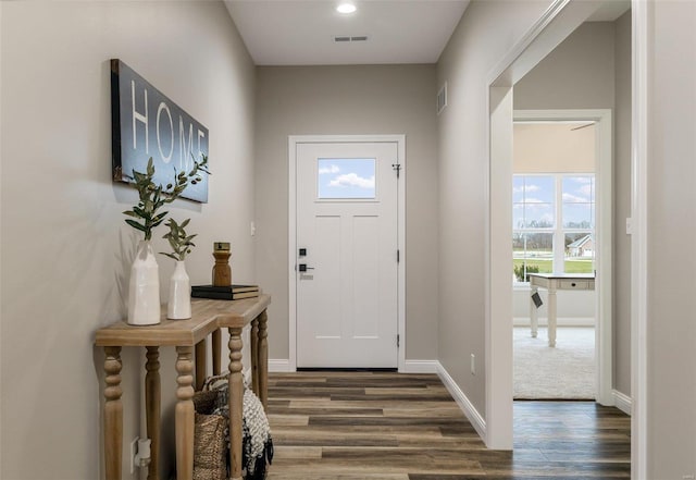 foyer entrance featuring dark hardwood / wood-style flooring