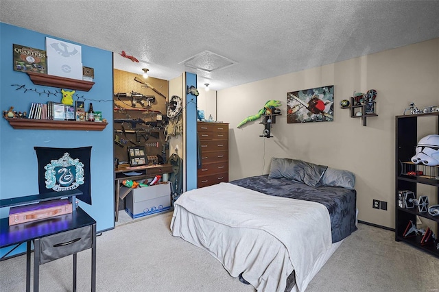 bedroom with light colored carpet and a textured ceiling