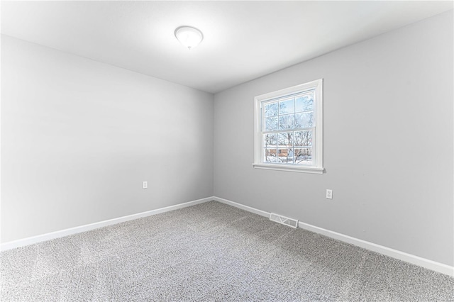 unfurnished room featuring carpet floors